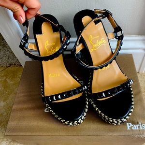 Christian Louboutin
Women's sandals